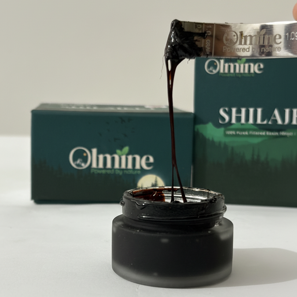 Olimine Shilajit product with a droplet being poured into a container on a white background.